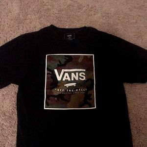 A Boys (12-14) sized Vans T Shirt. Has a tiny tear at the bottom.